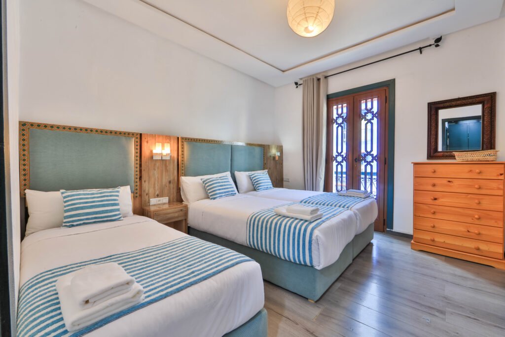 Adrar — Triple Room & Medina View · Room interior